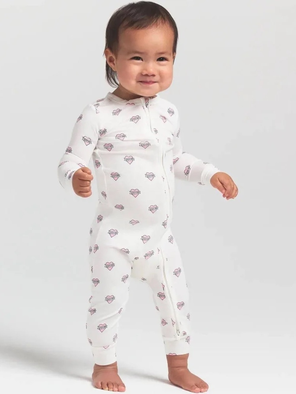 SKIMS White One-Piece with Pink Heart Print Zip Footie